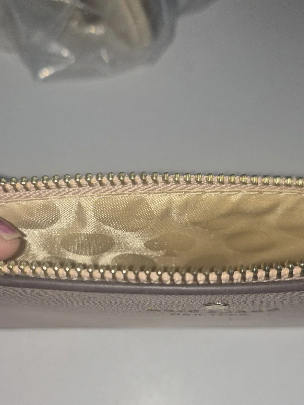kate spade metallic rose gold wristlet wallet